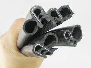 Co-extruded automotive rubber profile